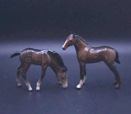 Beswick pair brown foals - of,
