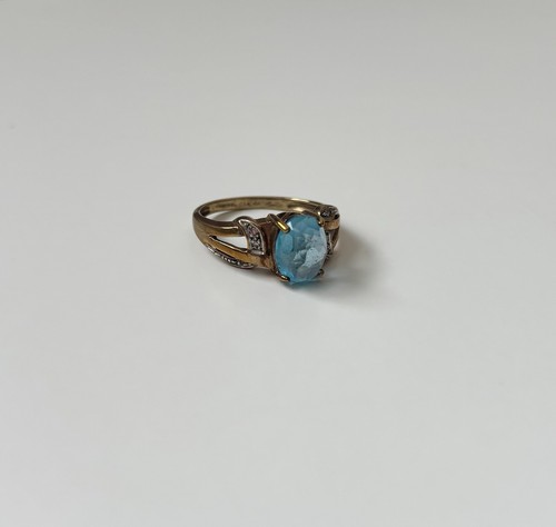 Sky blue topaz and diamond - and, 9k