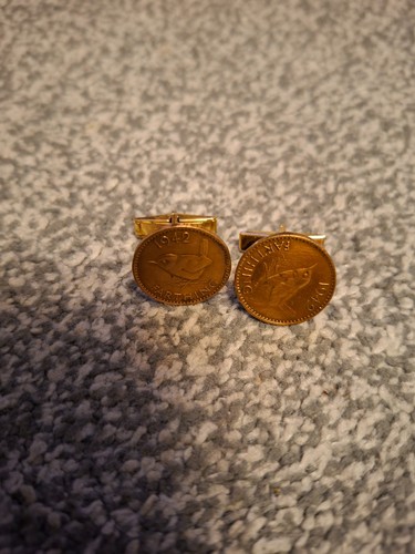 Penny farthing coin - &,