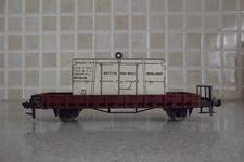 FIEISCHMANN OF GERMANY ,4 WHEELED LONG WHEEL BASE FLAT WAGON HO/00 IN BROWN.