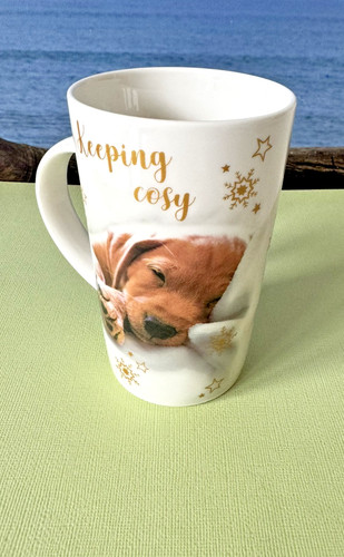 Dog keeping cosy latte - dog,