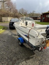 Speed Boat With Small Cuddy And Galvanised Trailer.
