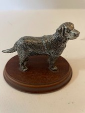 Labrador,Golden Retriever Pewter ornament on Wooden base.