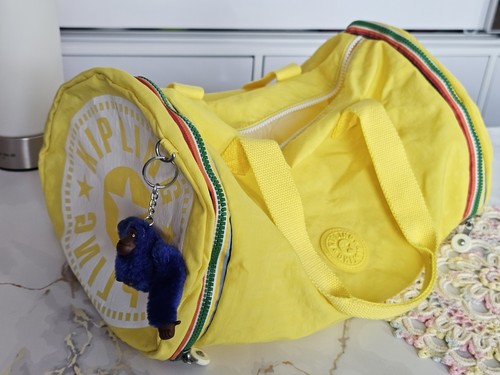 Kipling yellow cylinder - kipling,