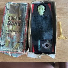 Vintage Coffin Bank Hong Kong Wind Up Money Box Spooky clockwork skeleton 