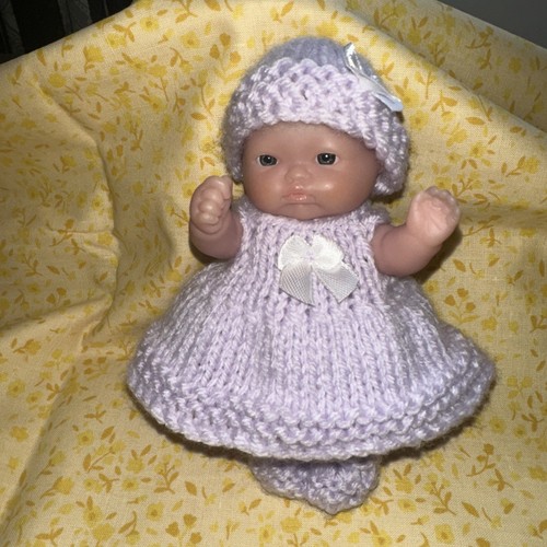 Hand knitted dolls clothes for - hand,