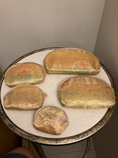 set of Five x makeup bags/purses with zip closure that all fit inside each other