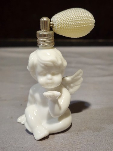 Vintage white porcelain cherub - vintage,