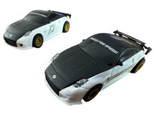 2 X Micro Scalextric Nissan