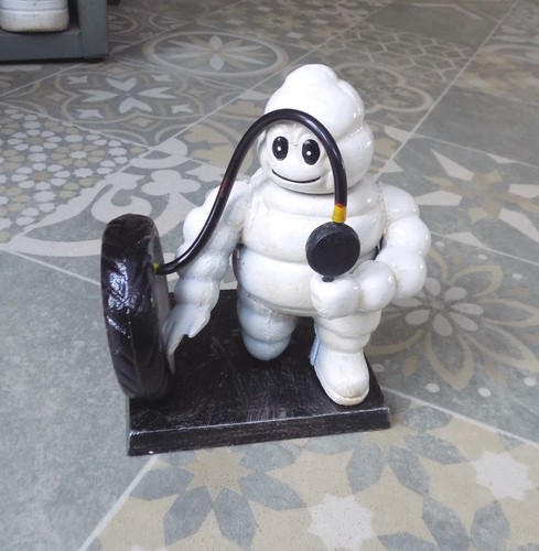 Michelin man inflating - michelin, a