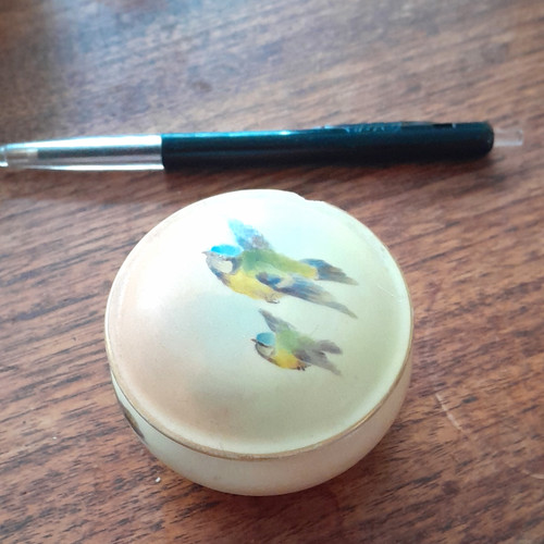 Beige china porcelain bird - china,