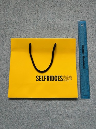 Selfridges yellow gift - &,