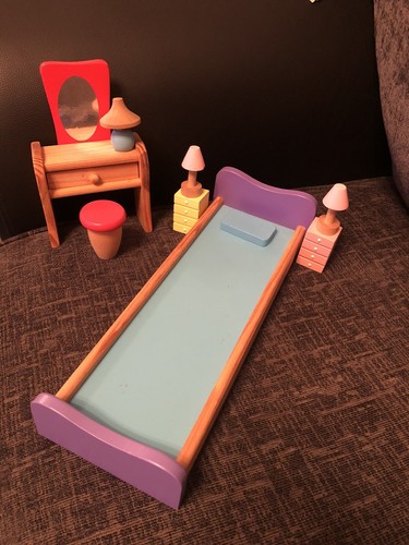 Coloured wooden dolls house - wooden,