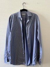 Alain Figaret Blue check
