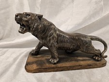 Antique Brass Tiger on Wood