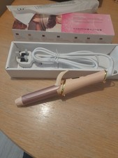Curling wand Lily england deluxe 25MM New.                                      