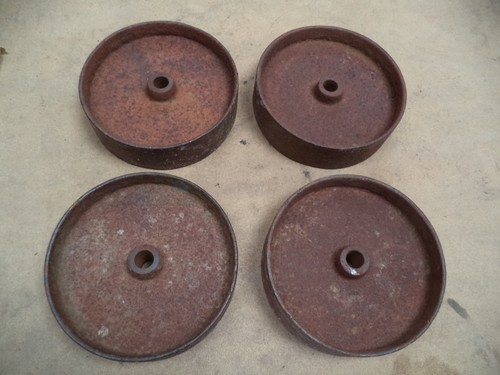 Four cast iron - cast, wheels