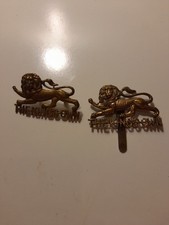 Pair of Kings Own Cap Badges In Brass Lug And Slide