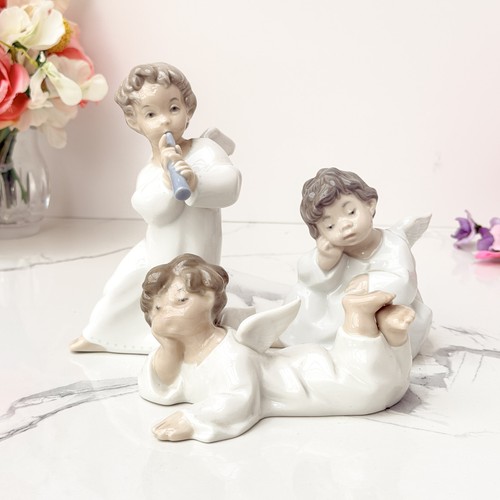 Lladro set angel figurines - 3,