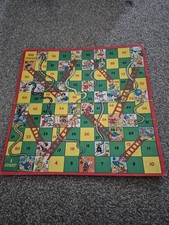 Snakes and ladders board - and,
