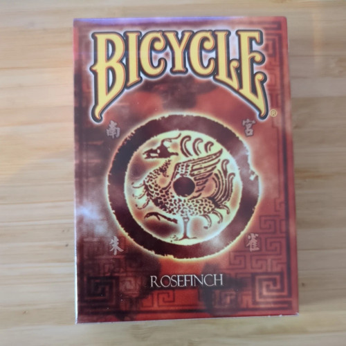 Bicycle rosefinch playing - bicycle,