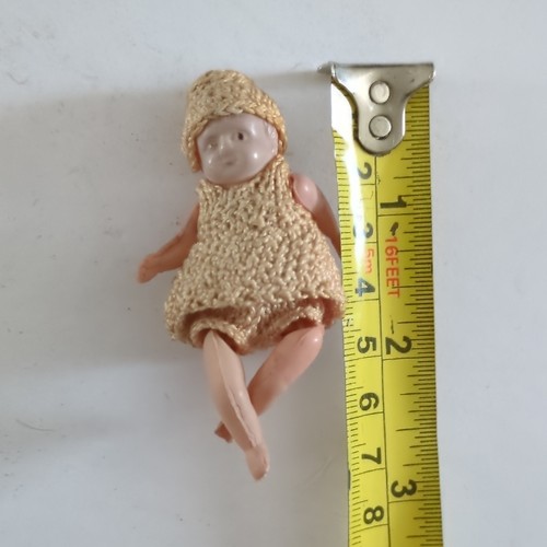 Tiny vintage miniature baby