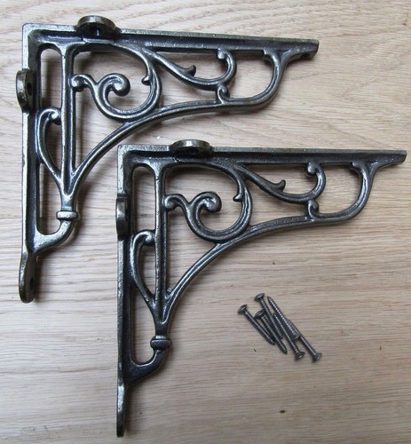 Pair antique iron cast - of,