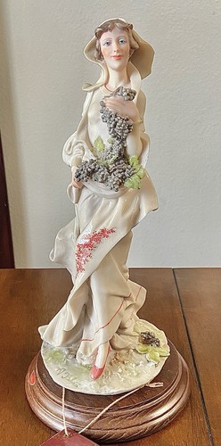 Belcari lady holding - 11”,
