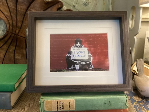 Banksy want change - "i, change"