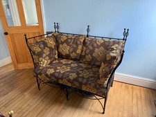 small 2 seater settee, ornate metal frame 