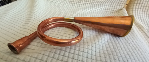 Antique copper coiled hunting