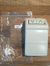 Hinge rail transmitter button