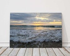 Ocean waves at sunset taken at