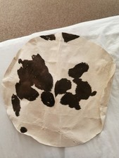 Antique Cow Hide Circular Piece Small Holes