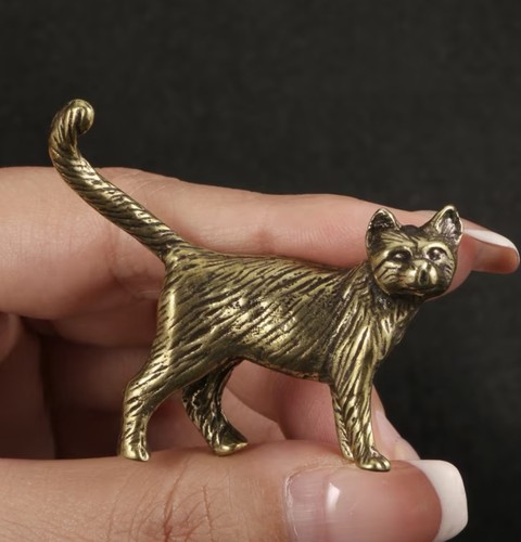 Small brass coloured - brass-coloured, cat