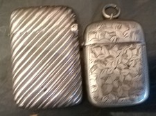 TWO ANTIQUE CONTINENTAL SILVER(?) VESTA CASES.