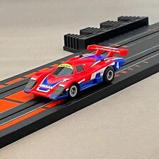 AFX Nissan March 86G Nismo Red