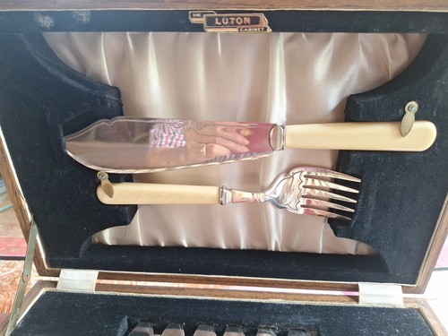 Boxed fish knives and forks - and,