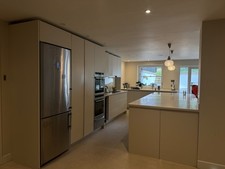 Bespoke off white kitchen, Corian worktop, Neff, Quooker & Liebherr appliances