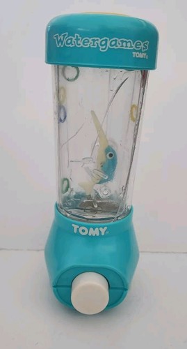 Dolphin water game - dolphin, held