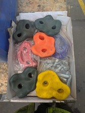 selection of climbing grips with bolts