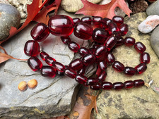 Vintage cherry amber bakelite barrel bead necklace. Simichrome Tested. 88g