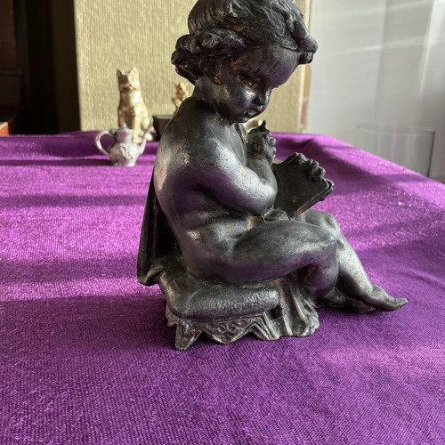 Black metal cherub figurine - cherub,