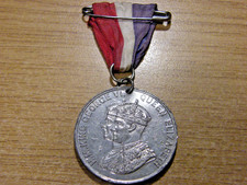 A 1937 King George VI Coronation medal  w/- ribbon- nice condition 39mm