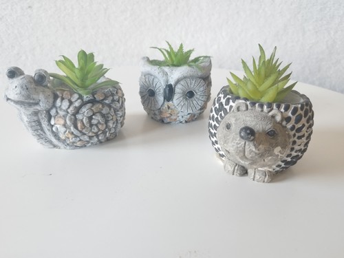 Ceramic plant pots with faux - pots,