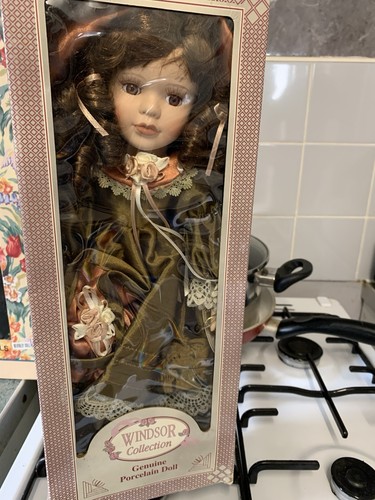 Porcelain doll never been - been, out