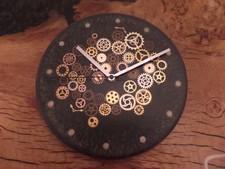 Unique large black metalic pigment resin wall clock with metal gear cogs design.
