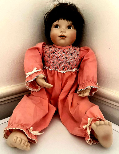 Haunted porcelain doll lottie - porcelain,