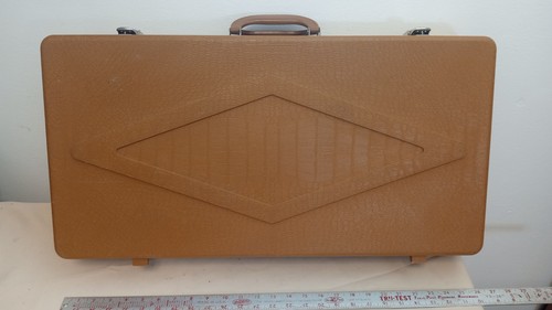 Vintage brown doskocil gun - doskocil,