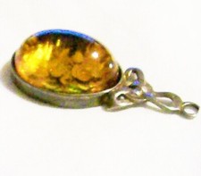 Green Amber Stone Pendant on silver Celtic knot setting vintage 1980s vgc